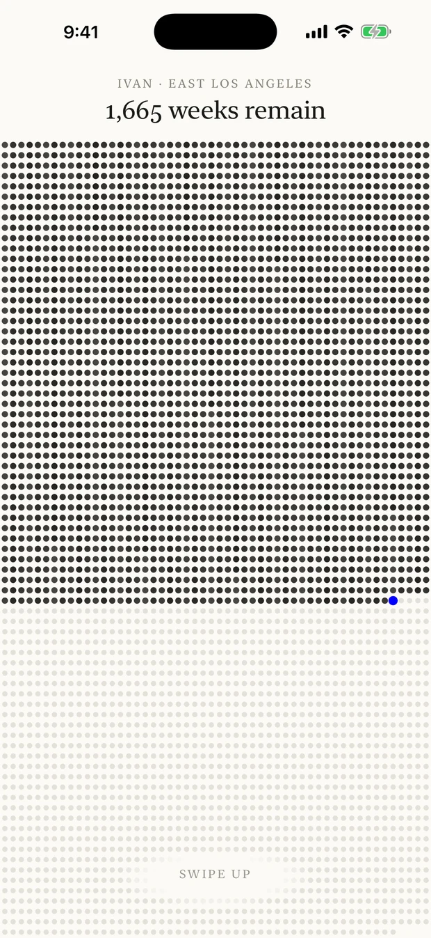 The grid: four thousand small circles, the lived weeks filled in ink, the current week breathing in blue
